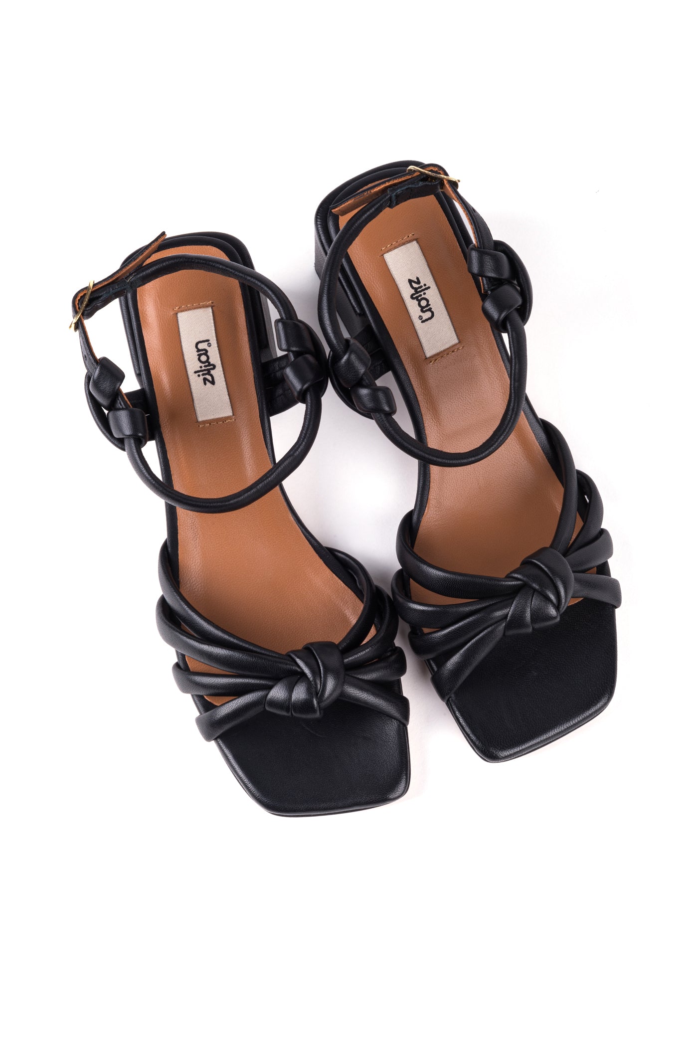 Sandálias salto médio em pele