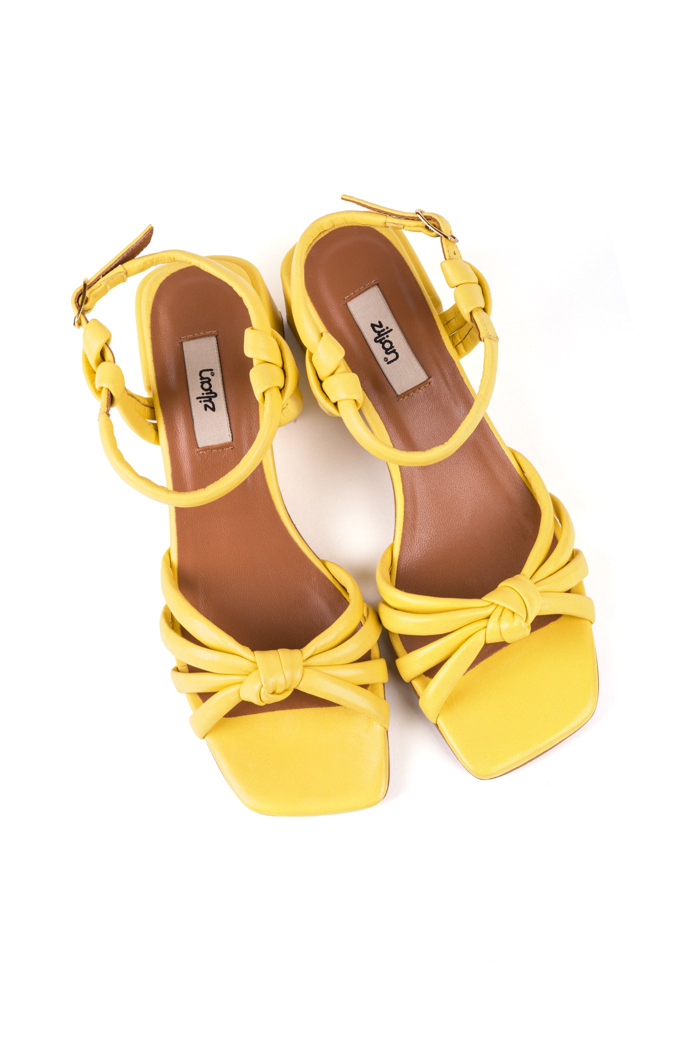 Sandálias salto médio em pele