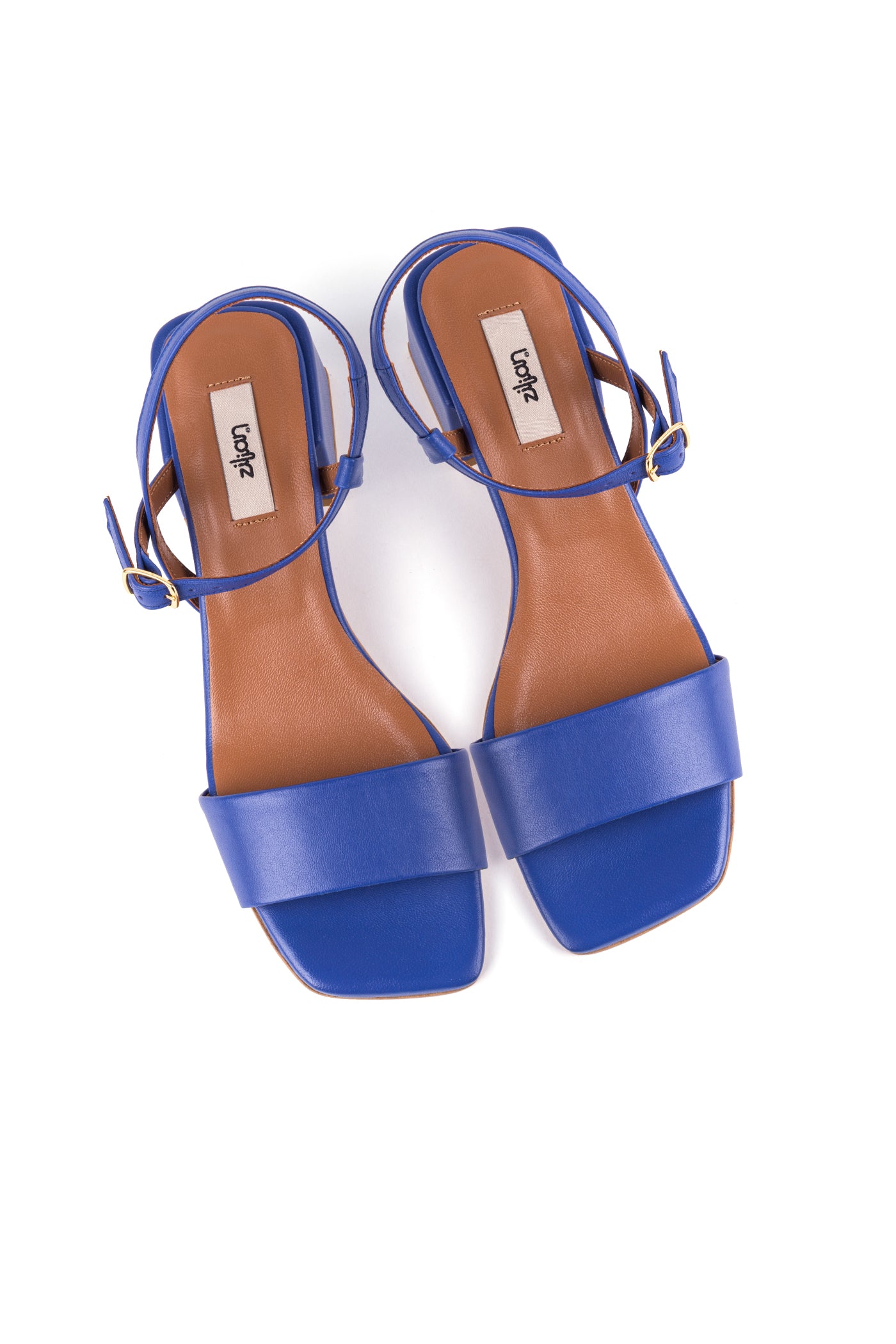 Sandálias salto médio em pele