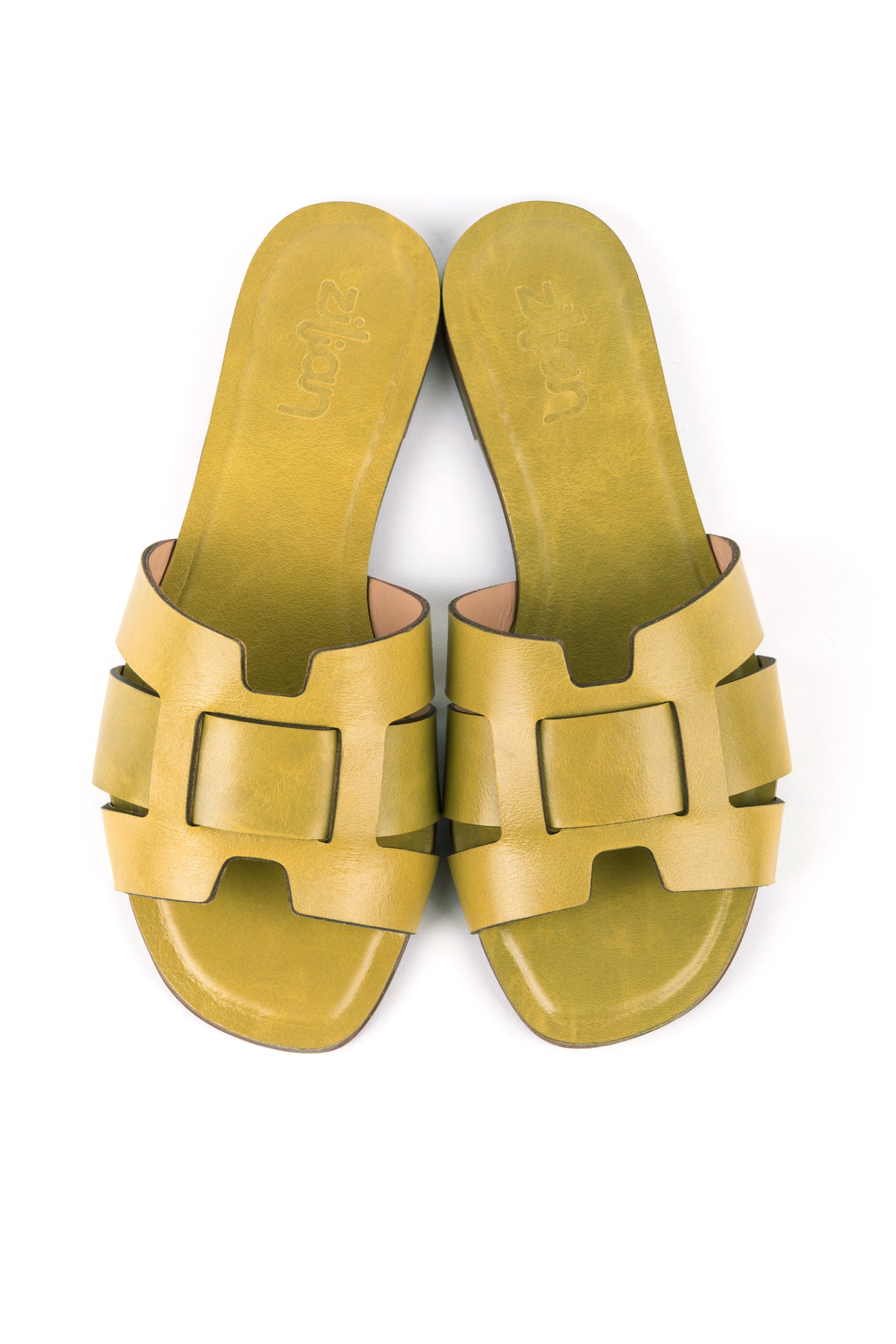 Sandálias rasas em pele