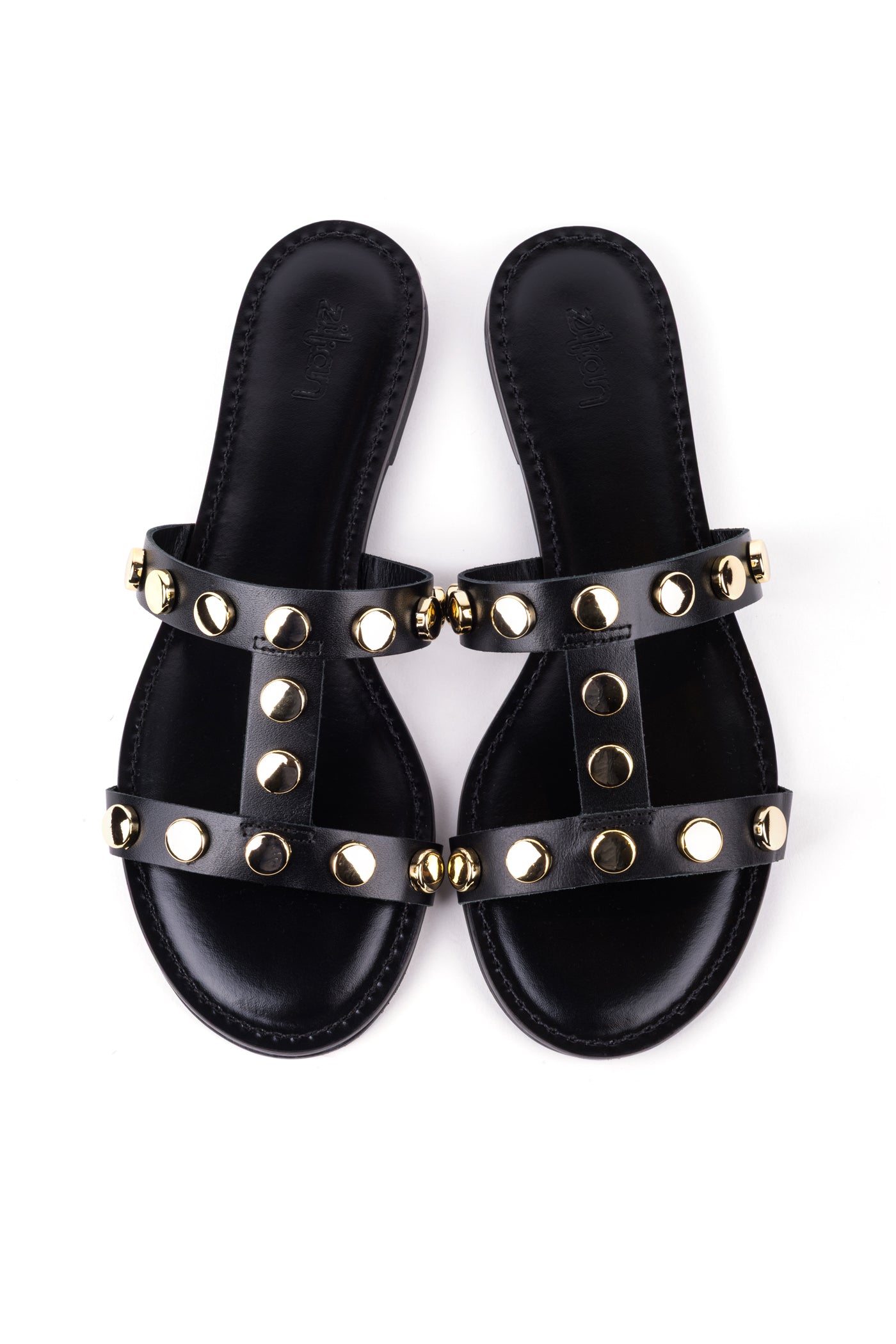 Sandálias rasas em pele