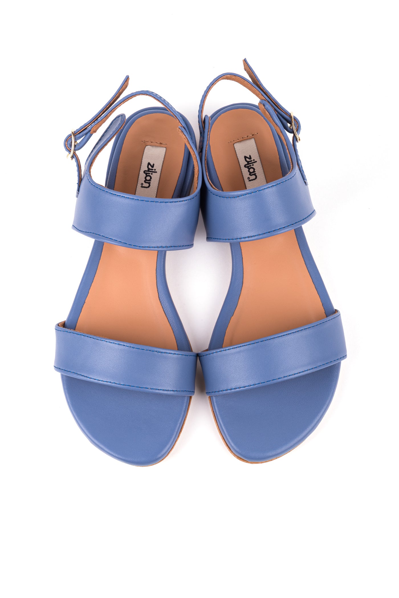 Sandálias rasas em pele