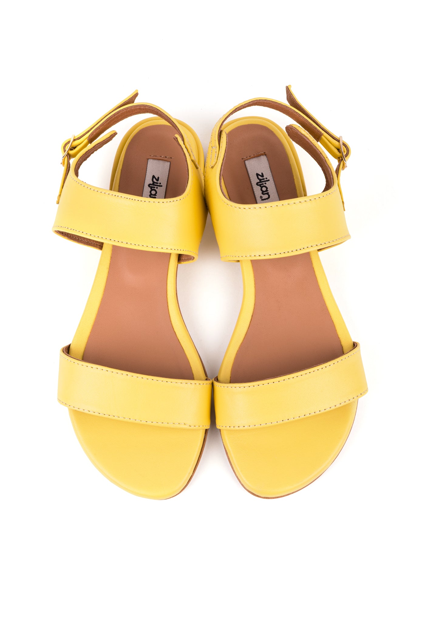 Sandálias rasas em pele