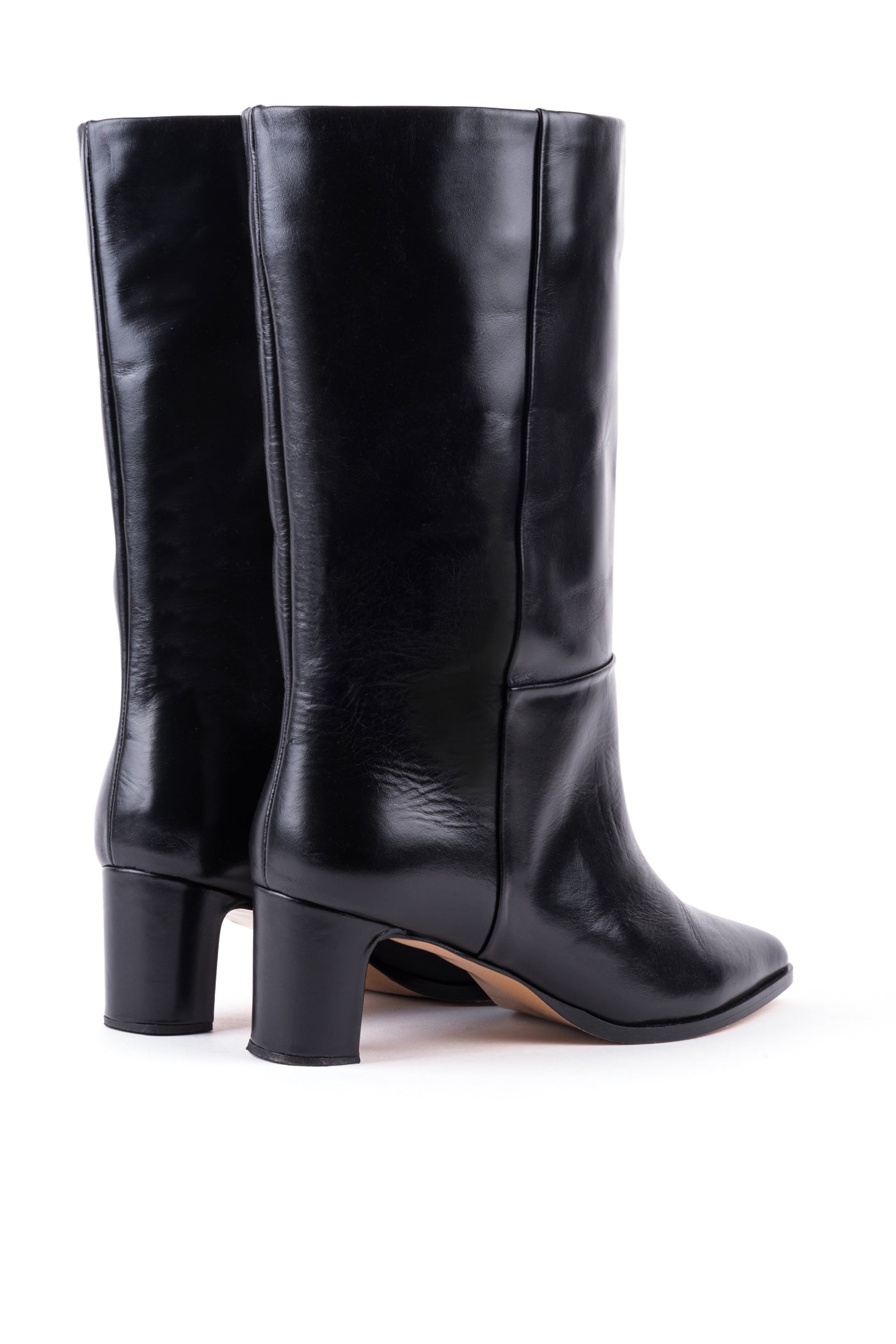 Botas cano alto em pele