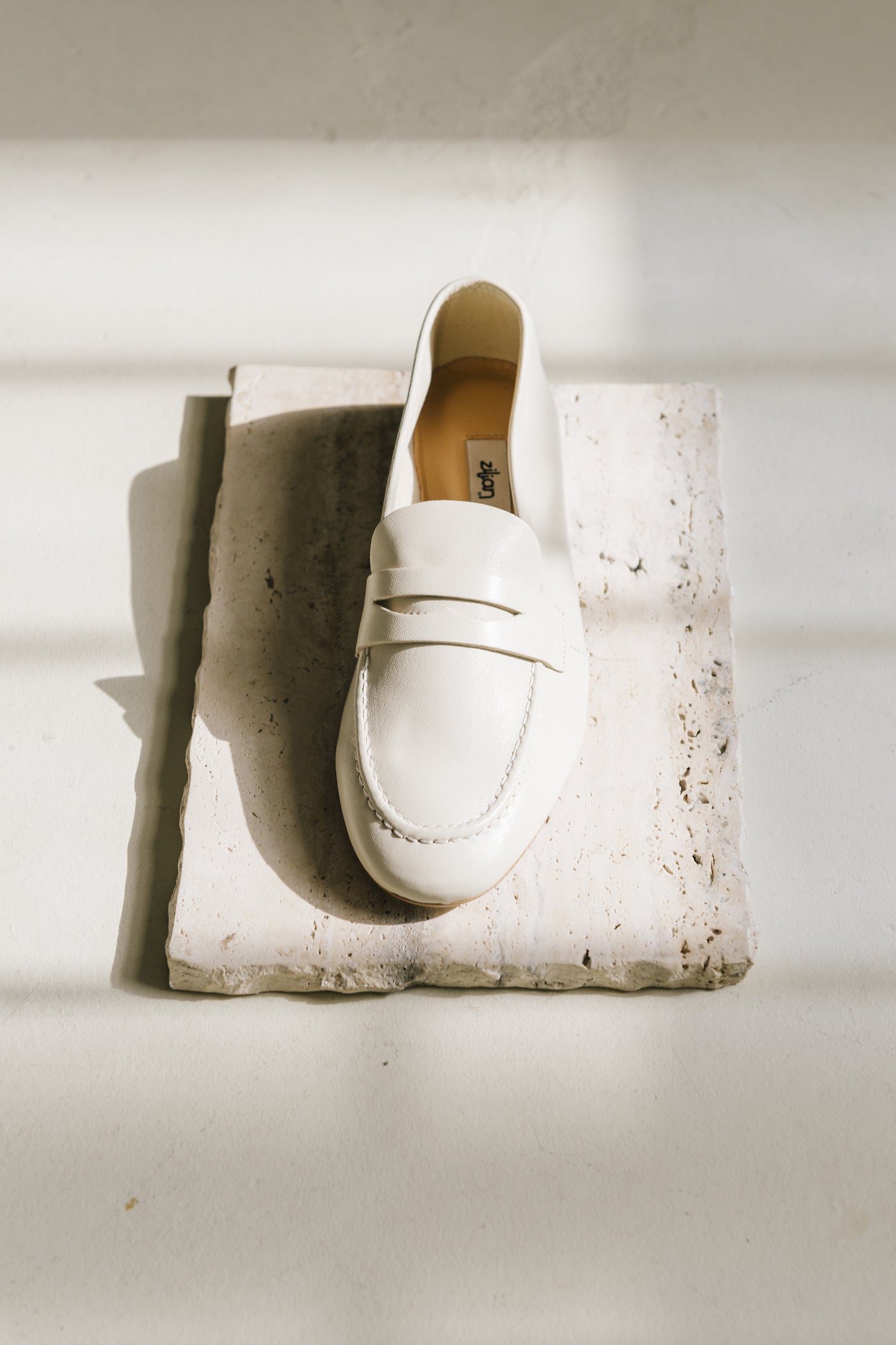 Loafers rasos em pele