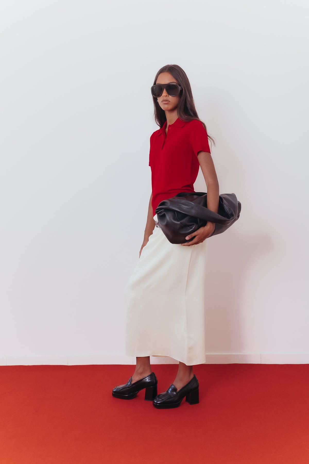 Loafers com franjas e salto compensado em pele