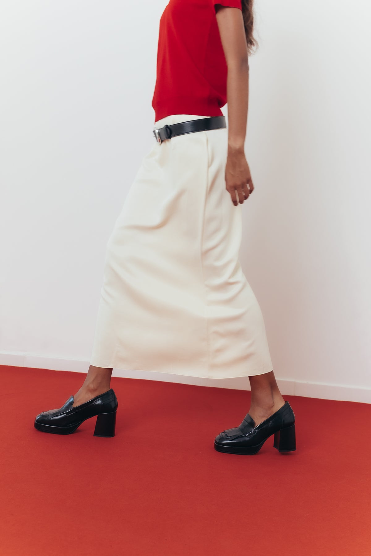 Loafers com franjas e salto compensado em pele