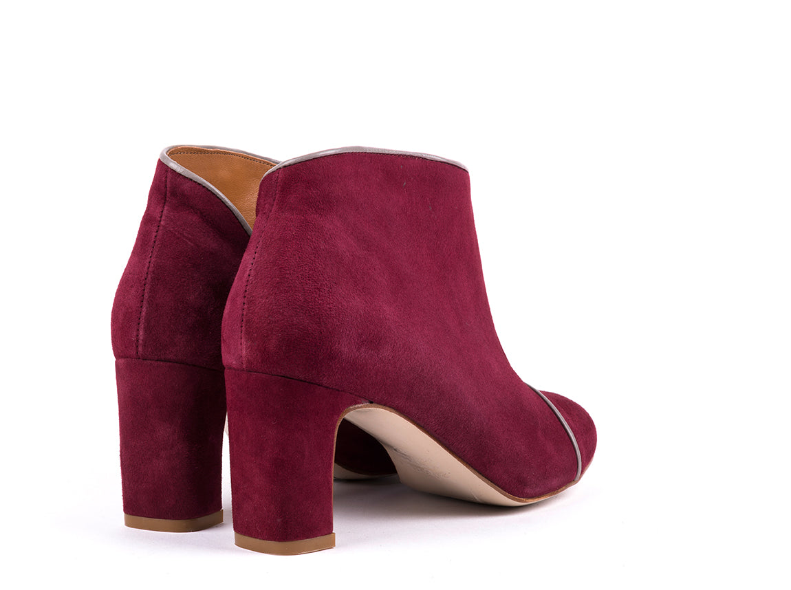 High-heeled ankle boots in bordeaux suede