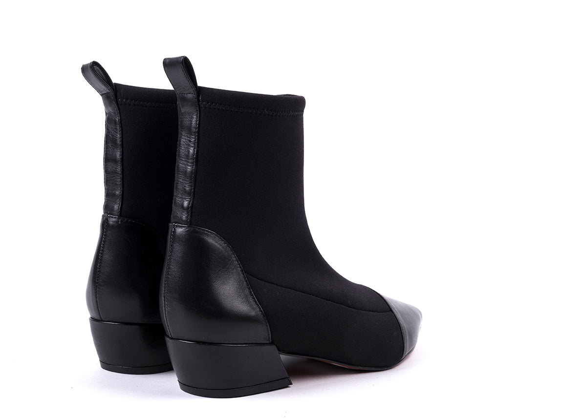Medium heeled ankle boots in black fabric