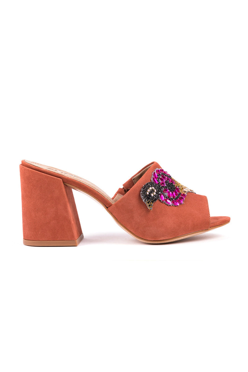 High-heeled mules in orange suede