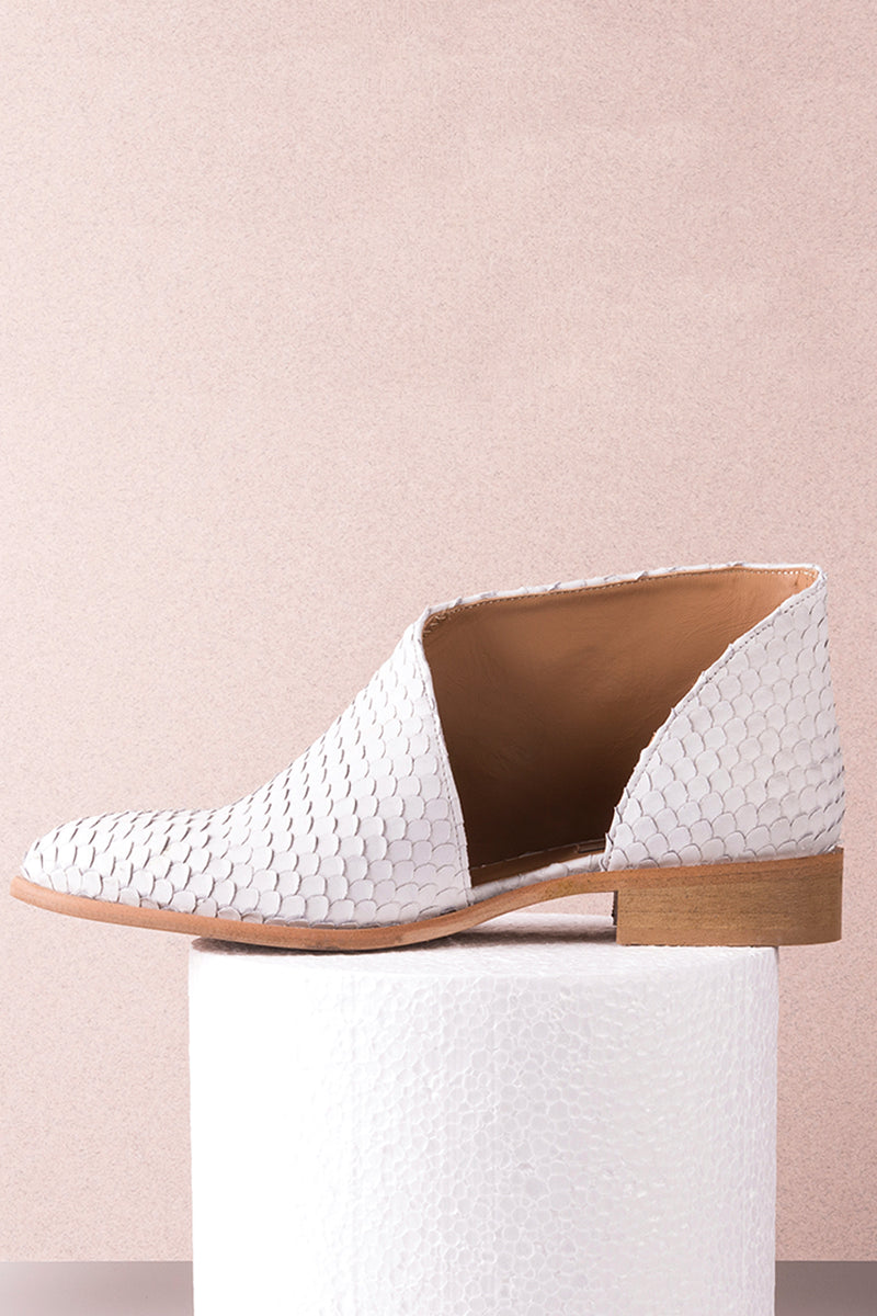 Flat ankle boots in white scaly leather