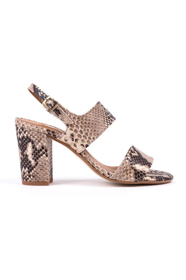 High-heeled sandals in natural patterned leather