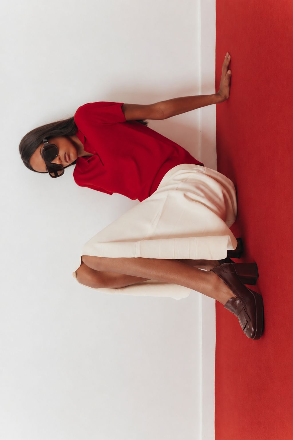 Loafers com franjas e salto compensado em pele