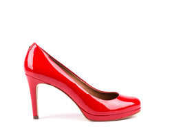 ​High-heeled shoes in varnish red leather