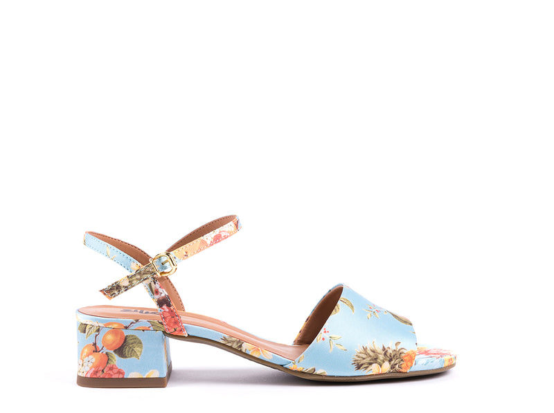 ​Med-heeled sandals in tropical pattern fabric