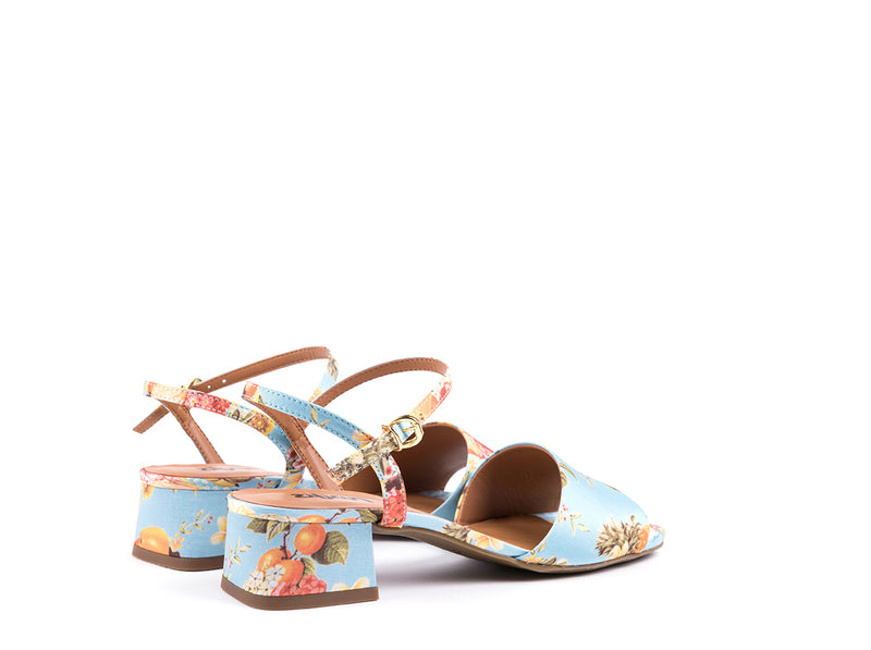 ​Med-heeled sandals in tropical pattern fabric