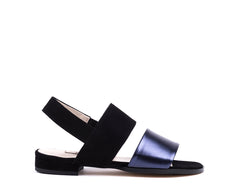 ​Flat sandals in black suede