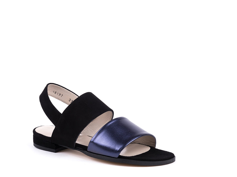 ​Flat sandals in black suede