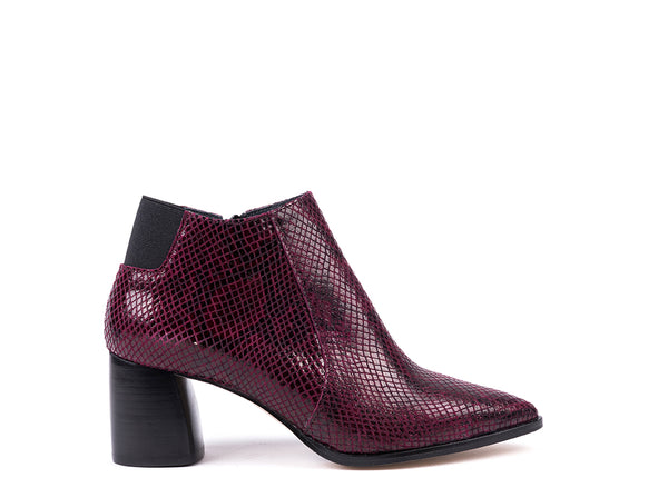 High-heeled ankle boots in embossed snake bordeaux leather