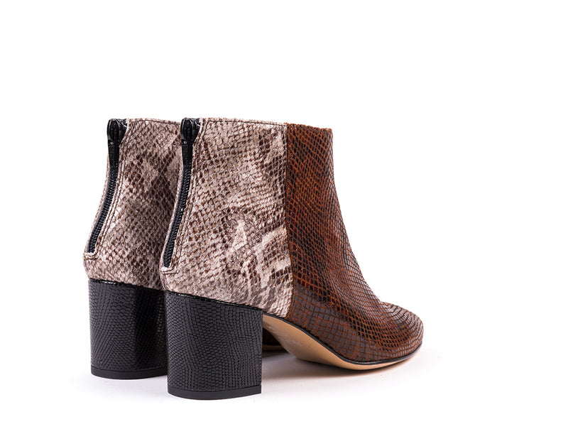 High-heeled ankle boots in leather with brown snake effect