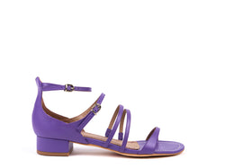 Flat sandals in purple leather