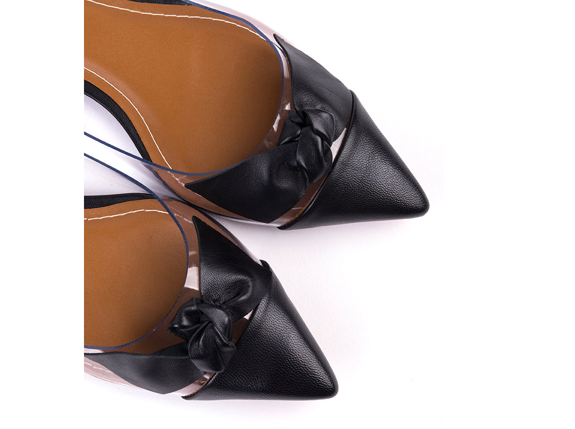 Black leather and vinyl ballet flats