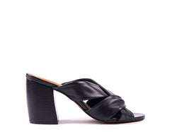 High-heeled mules in black leather