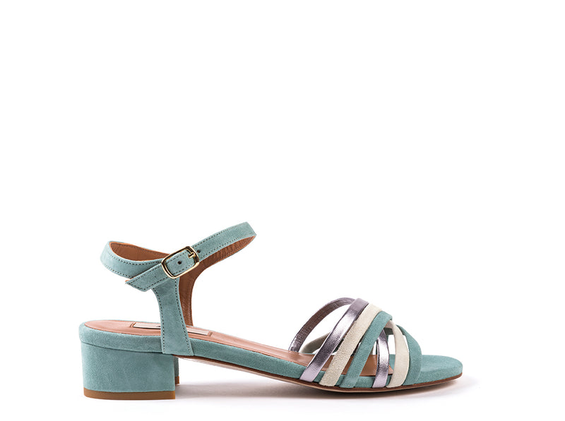 Med-heeled sandals in light green suede