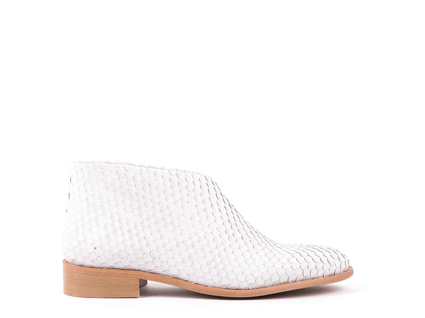 Flat ankle boots in white scaly leather