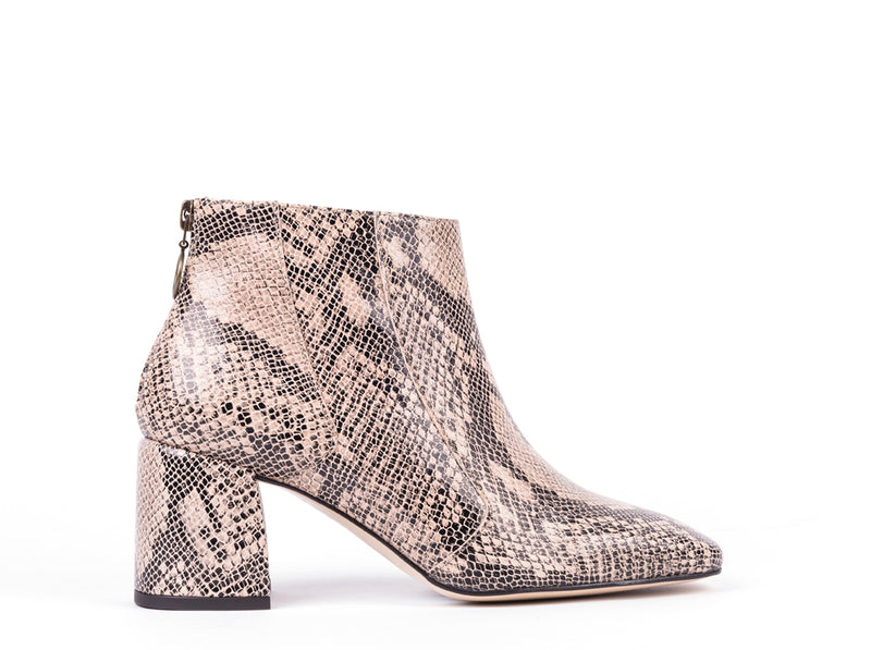 ​High-heeled ankle boots in engraved leather
