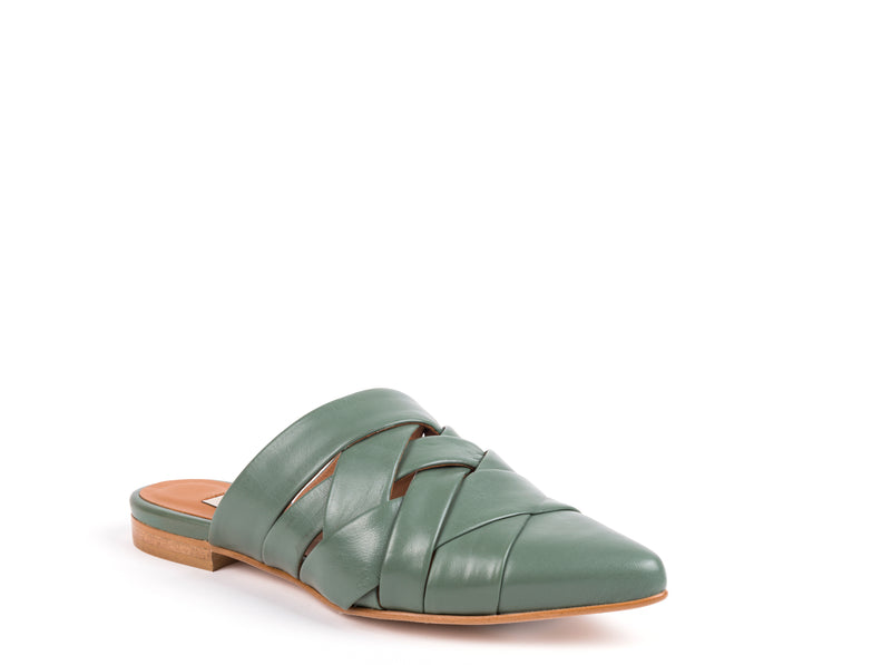 ​Flat mules in green leather