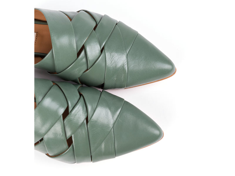 ​Flat mules in green leather