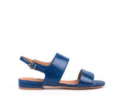 ​Flat sandals in blue engraved leather