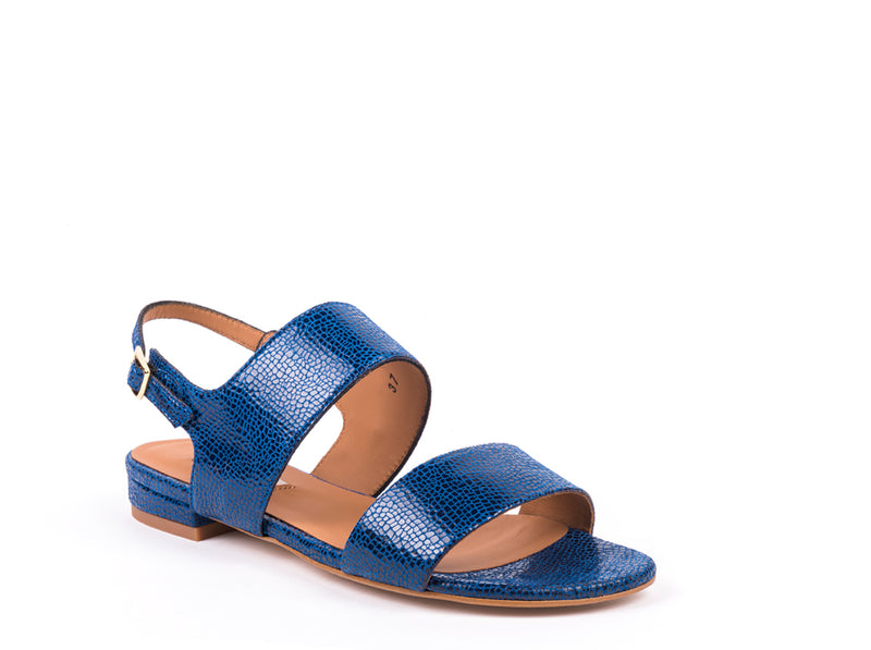 ​Flat sandals in blue engraved leather