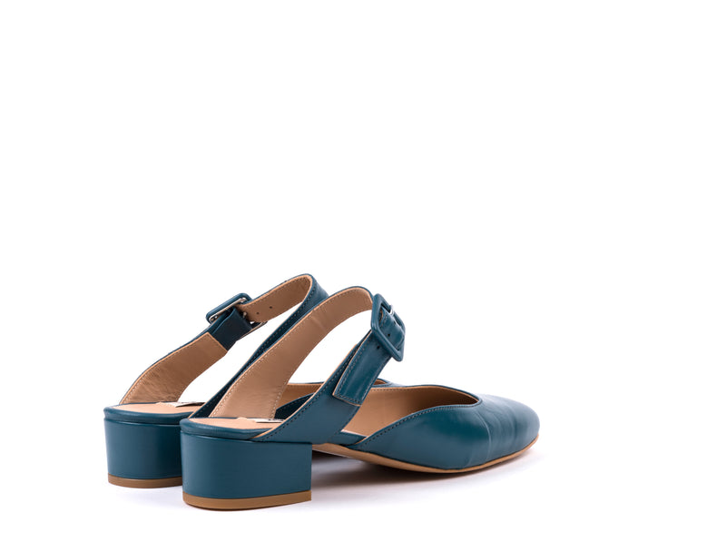 Medium heel leather mules in oil blue