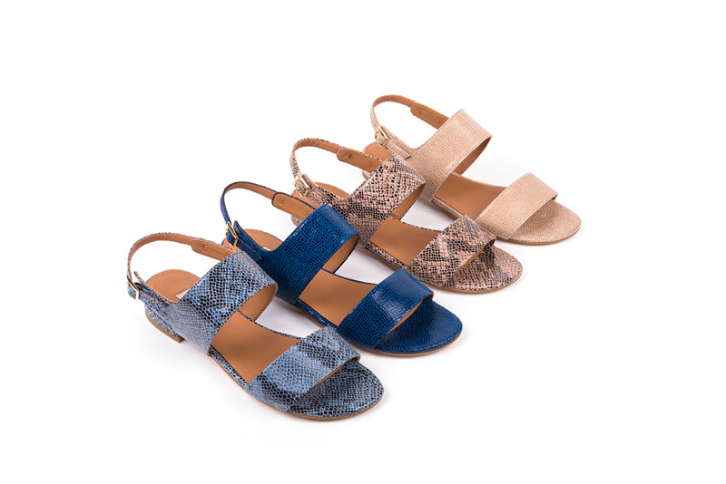 ​Flat sandals in blue engraved leather