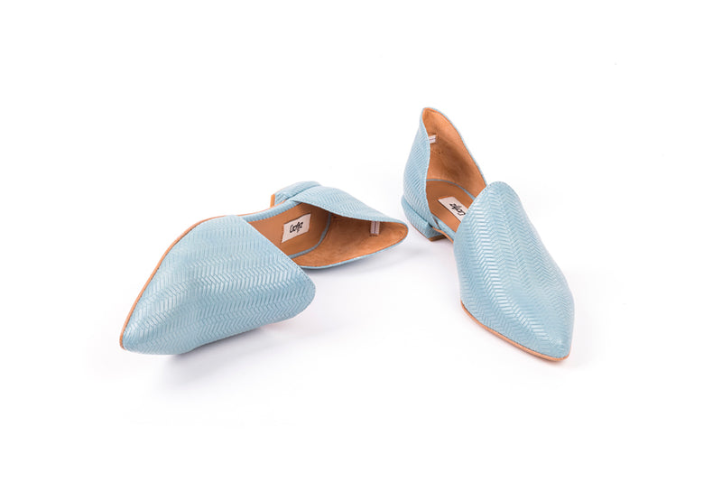 ​Flat shoes in light green patterned leather