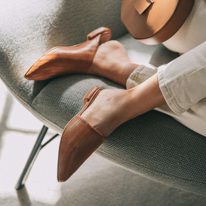 Mules in natural patterned leather